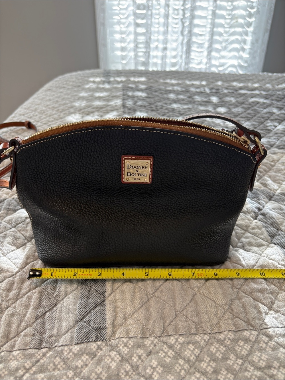 Dooney & Bourke Black Pebbled Leather Crossbody with Brown Trim